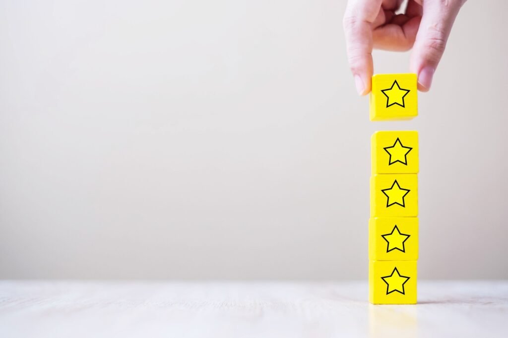 customer holding wooden blocks with the star symbol